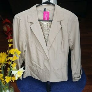 Ashley tan blazer with floral lining.